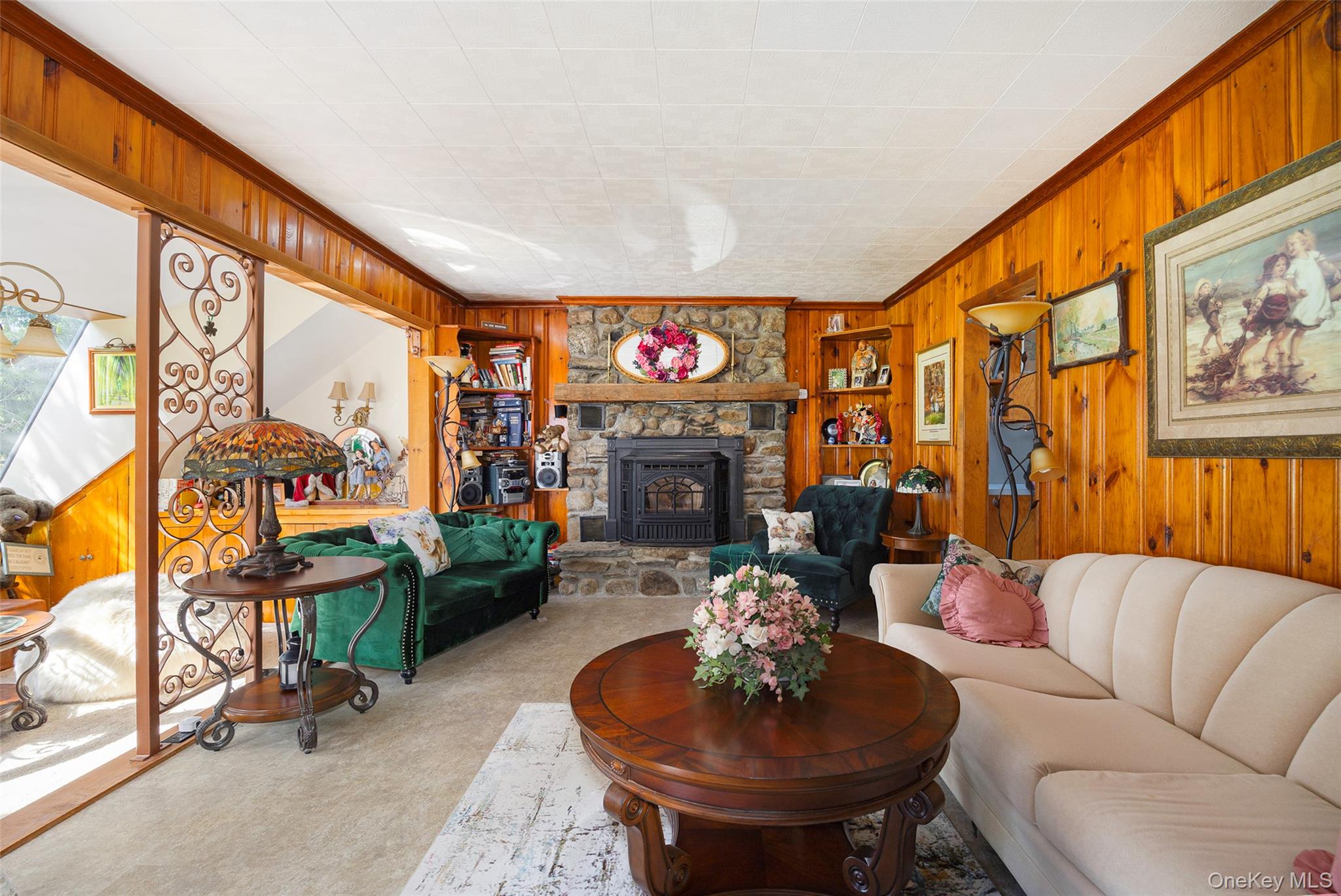 89 Deer Pond Road Verbank, NY 12585 - Photo 20 of 40 a living room with fireplace furniture and a large window