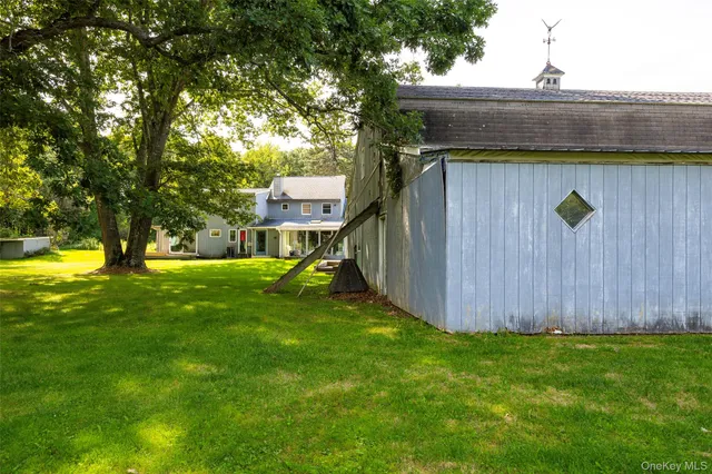 a view of a lake with a big yard