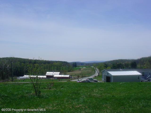 Rr Springville, PA 18844 - Photo 9 of 9 a view of a big yard with a house