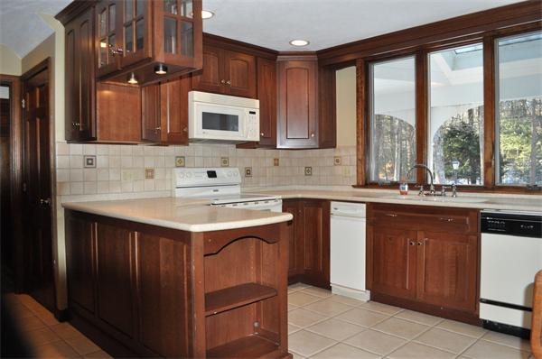 55 Herrick Road Boxford, MA 01921 - Photo 8 of 20 a kitchen with a sink stove and cabinets