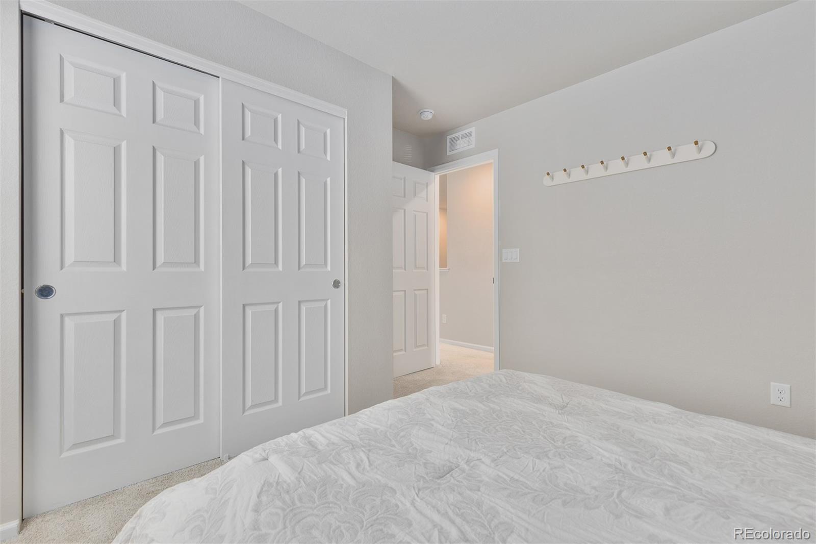 7199 Othello Street Castle Pines, CO 80108 - Photo 18 of 28 a view of a livingroom with an entryway