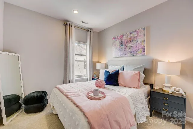 a bathroom with a double vanity sink toilet and shower
