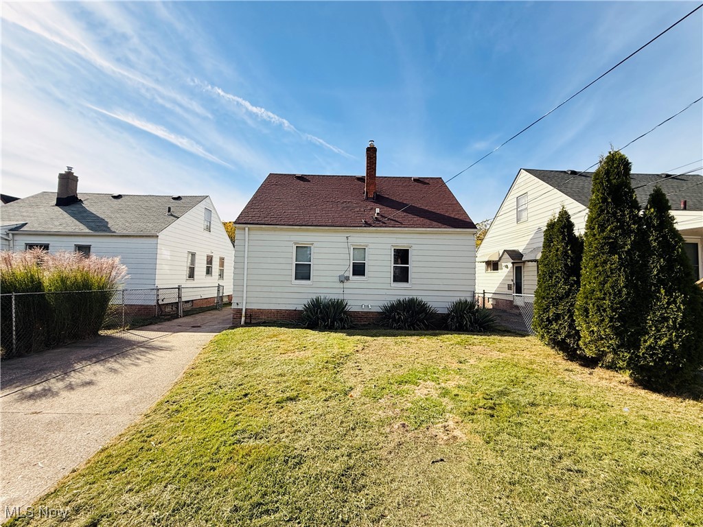 5239 Arch Street Maple Heights, OH 44137 - Photo 24 of 25 Rear view of property featuring a chimney