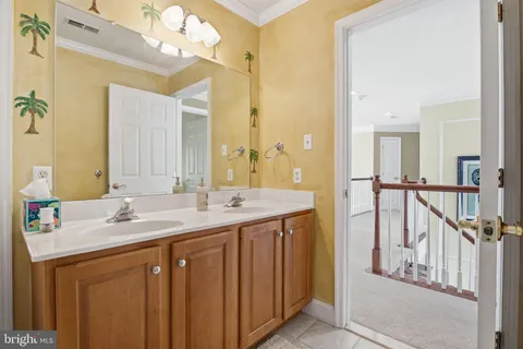 a picture of a bathroom with a shower