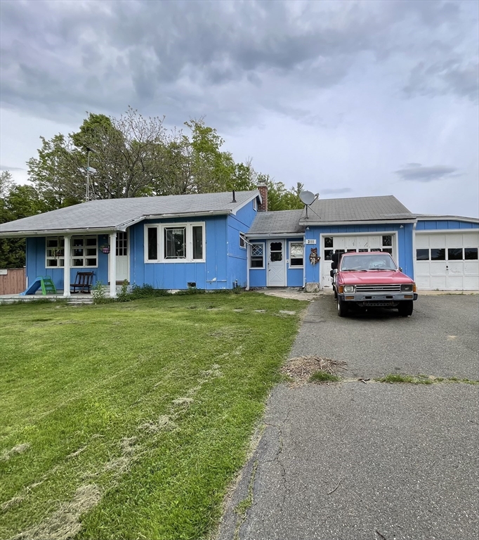 311 Cummington Road Ashfield, MA 01330 - Photo 11 of 11 a front view of a house with a garden