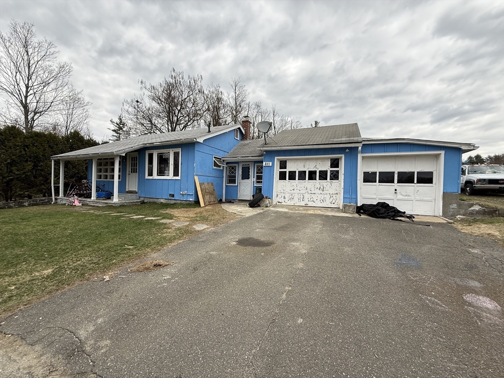311 Cummington Road Ashfield, MA 01330 - Photo 2 of 12 a front view of a house with a garden
