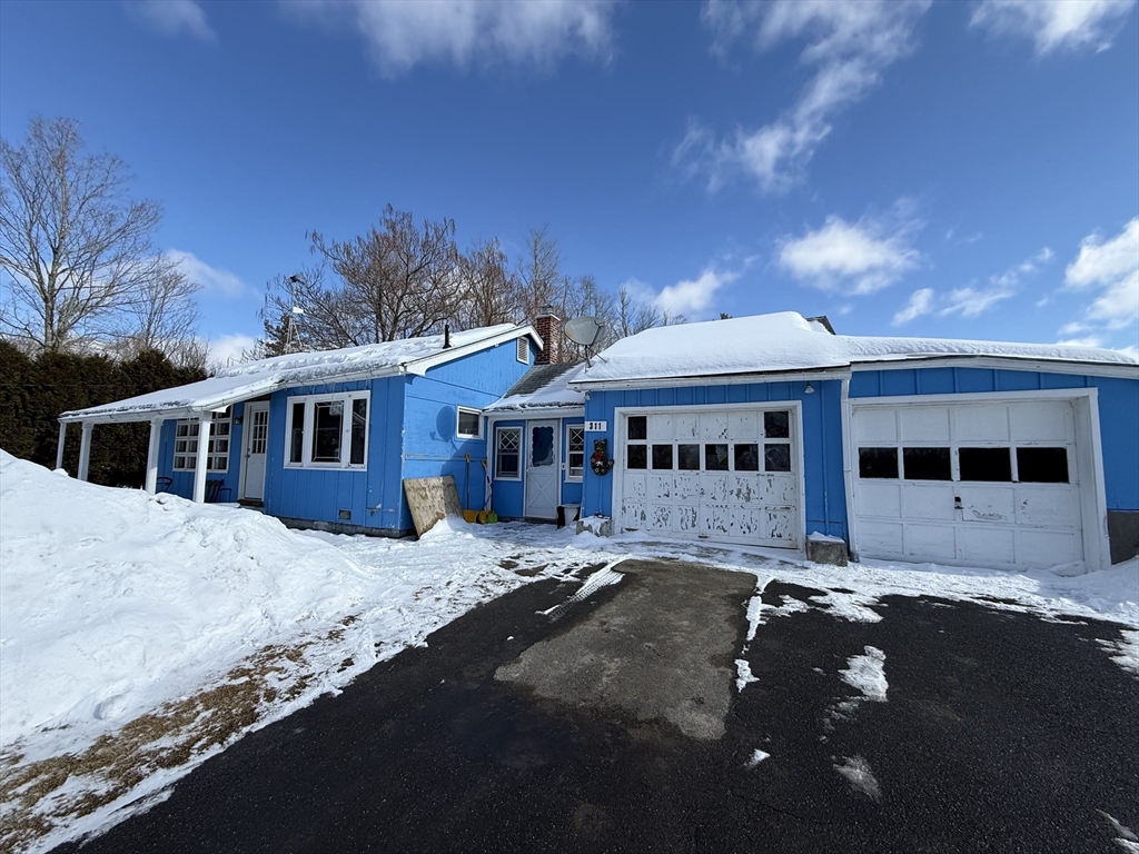 311 Cummington Road Ashfield, MA 01330 - Photo 2 of 11 a front view of a house with a yard