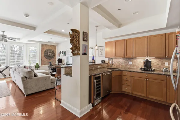 a kitchen with sink cabinets and window