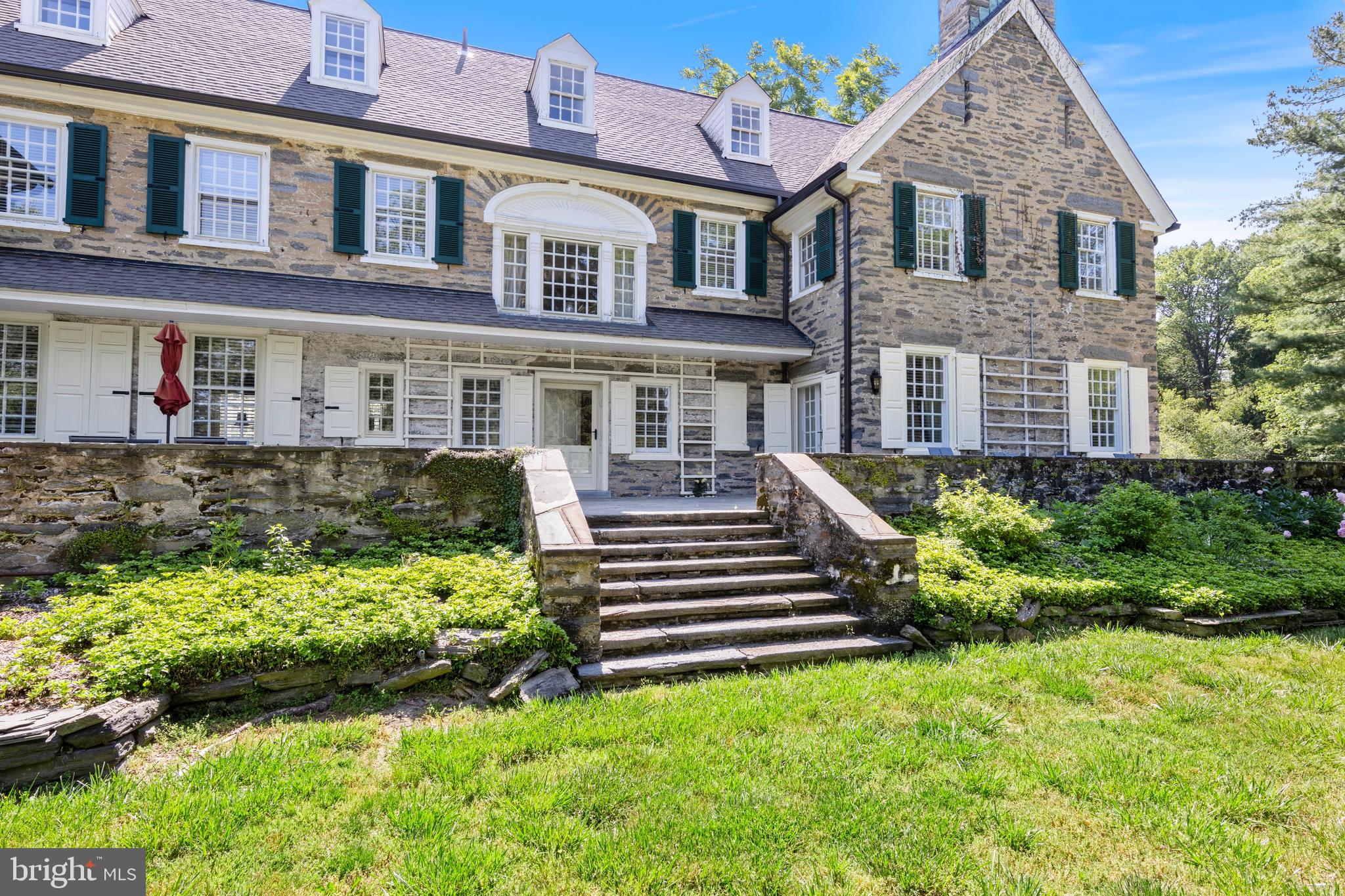8201 Fenton Road Glenside, PA 19038 - Photo 13 of 86 a front view of a house with a yard