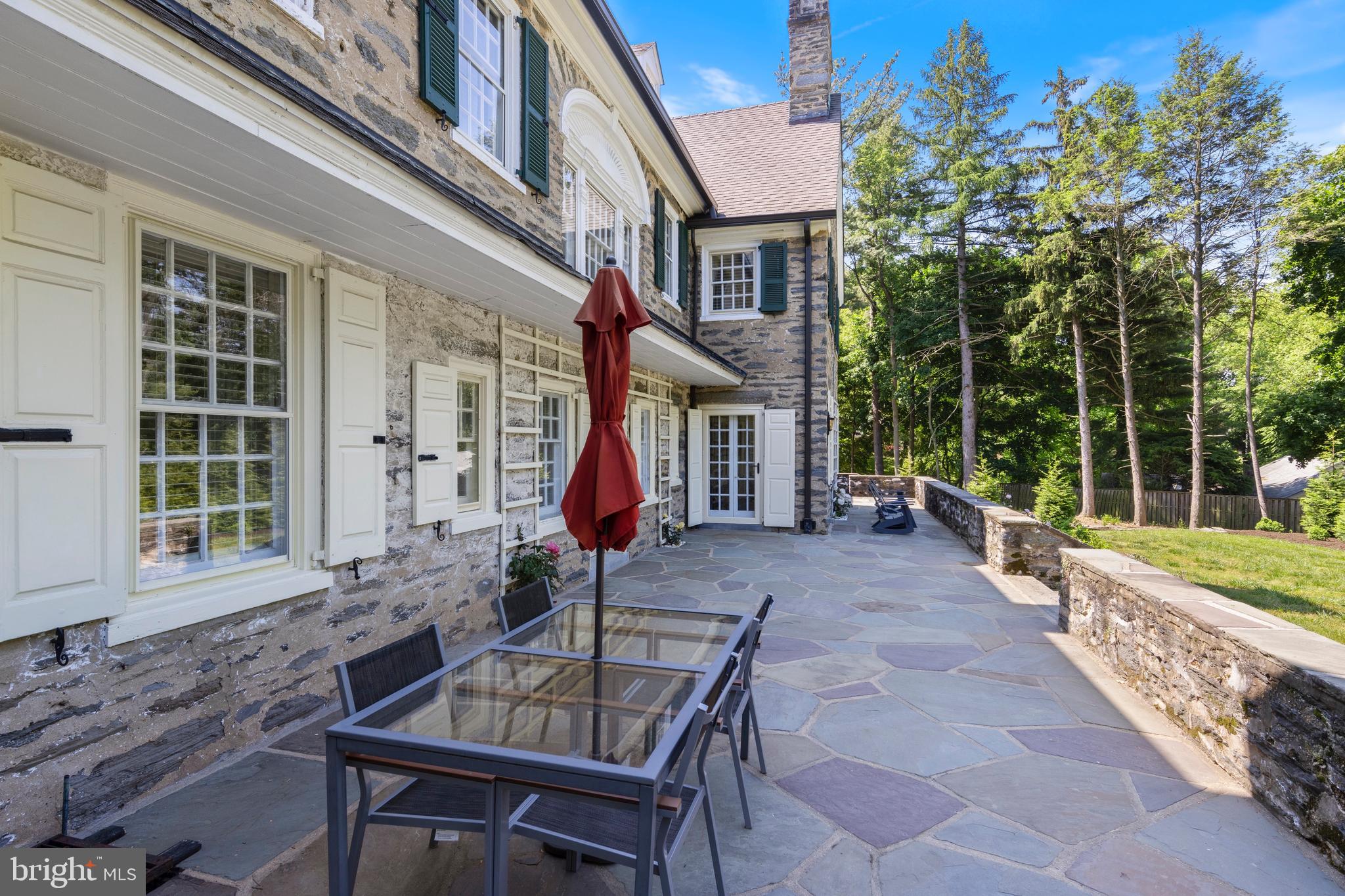 8201 Fenton Road Glenside, PA 19038 - Photo 14 of 86 a view of a house with backyard and porch