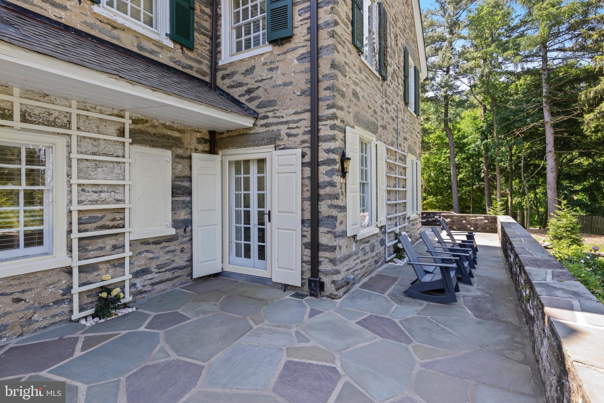 8201 Fenton Road Glenside, PA 19038 - Photo 15 of 86 a view of a patio with table and chairs and a barbeque