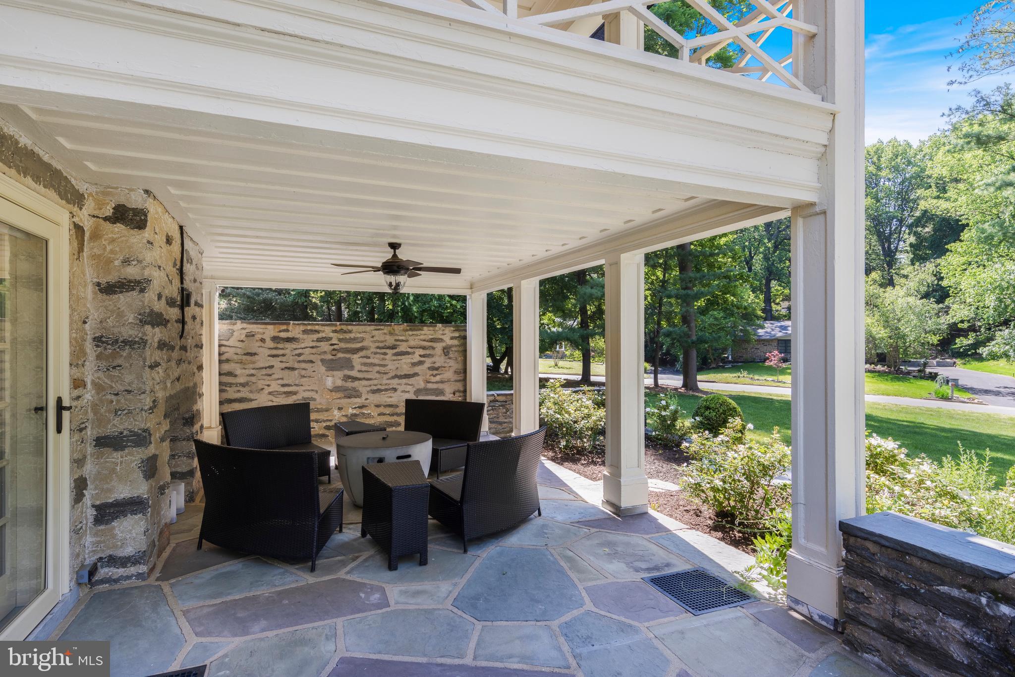 8201 Fenton Road Glenside, PA 19038 - Photo 17 of 86 a view of a patio with table and chairs potted plants with wooden floor