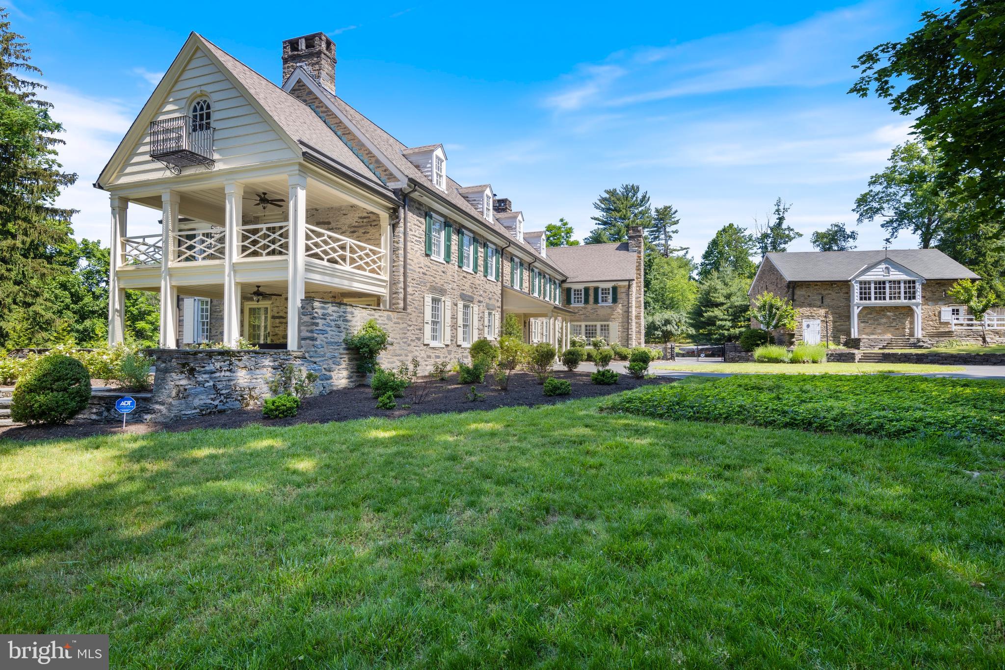 8201 Fenton Road Glenside, PA 19038 - Photo 21 of 86 a front view of a house with a garden