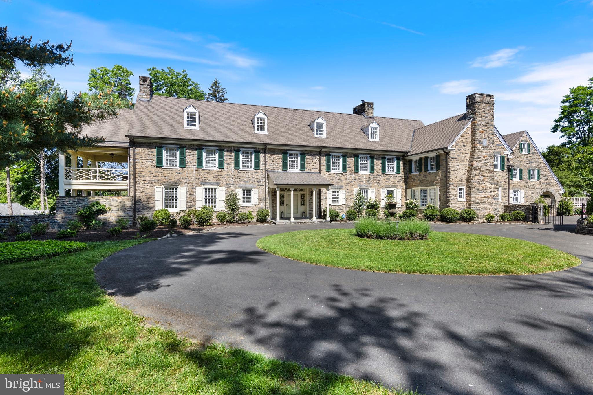 8201 Fenton Road Glenside, PA 19038 - Photo 3 of 86 a view of a big house with a big yard and large trees