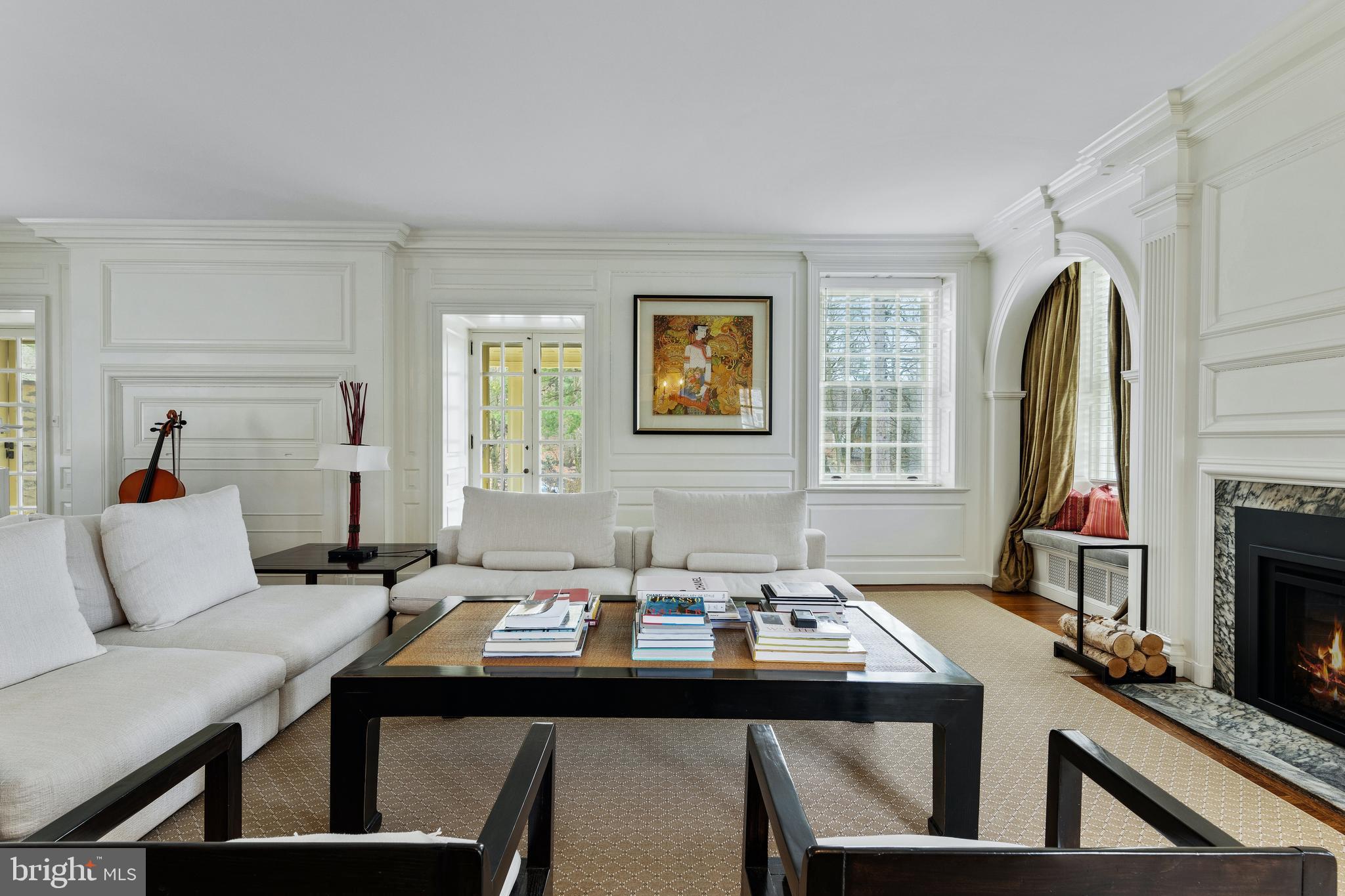 8201 Fenton Road Glenside, PA 19038 - Photo 41 of 86 a view of a dining room with furniture and a fireplace