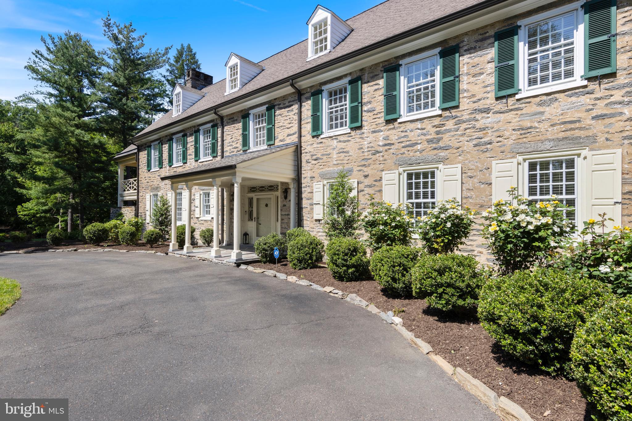 8201 Fenton Road Glenside, PA 19038 - Photo 5 of 86 a front view of a house with yard and glass windows