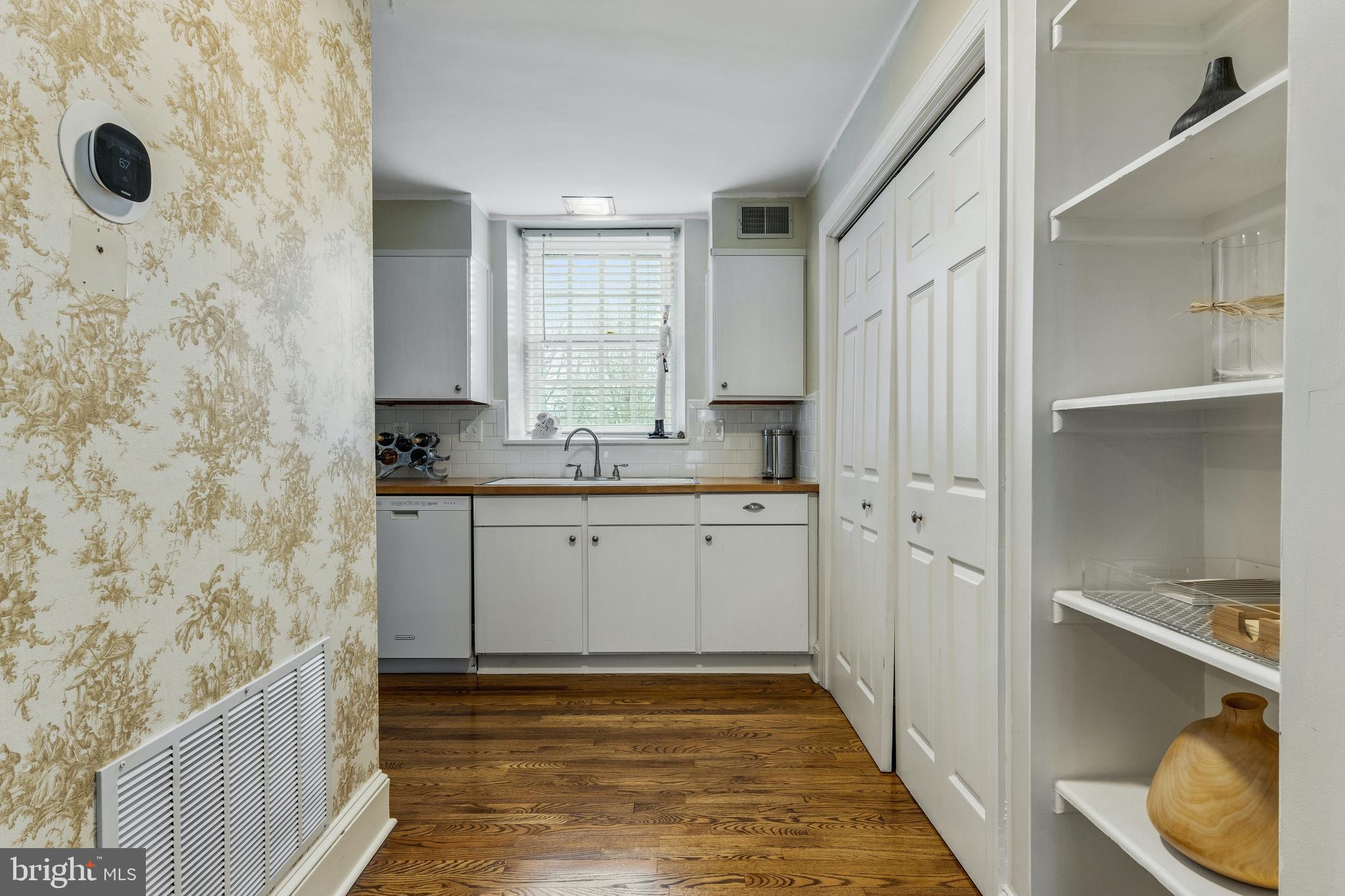 8201 Fenton Road Glenside, PA 19038 - Photo 53 of 86 a bathroom with a granite countertop sink a toilet and shower