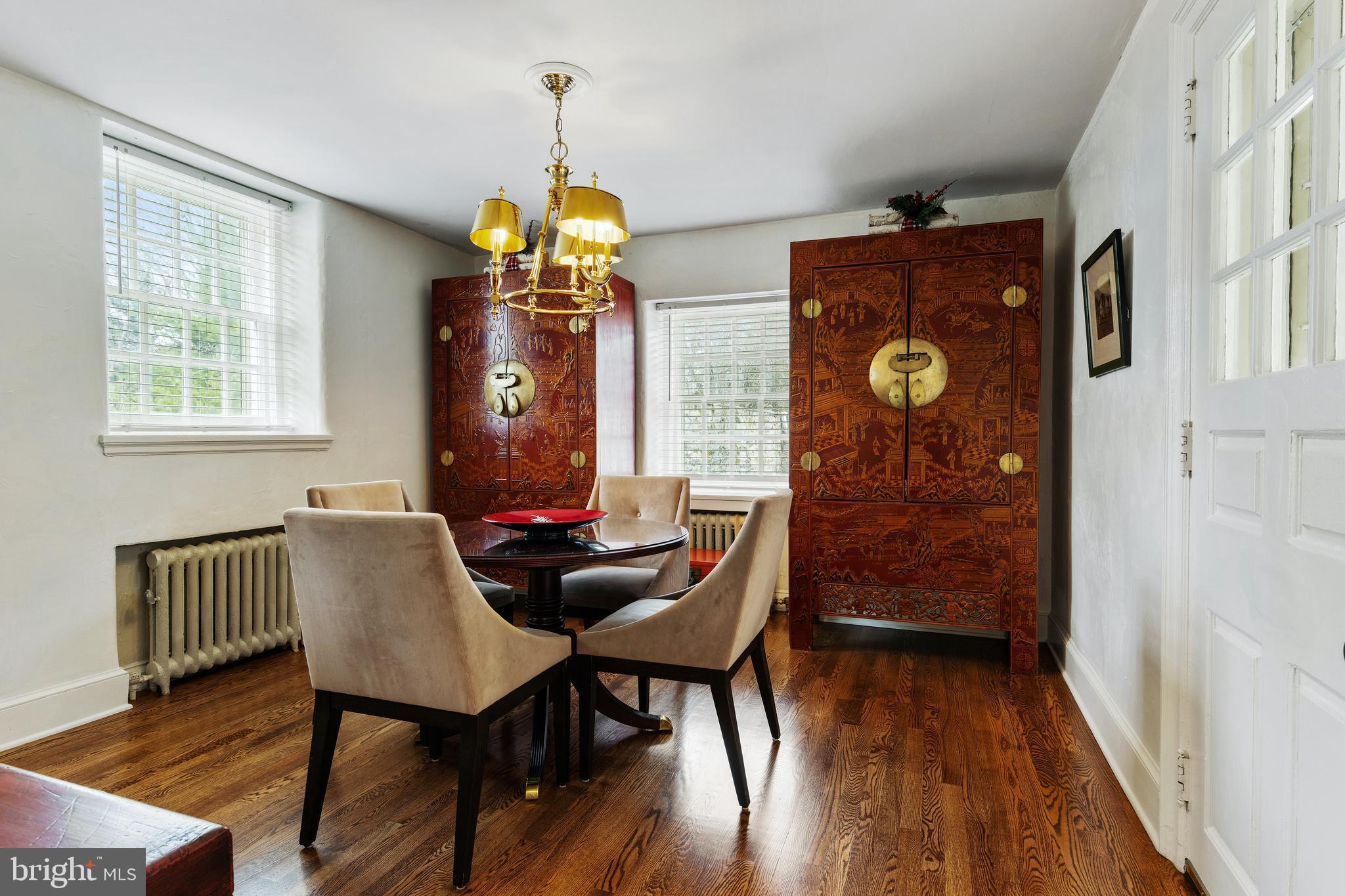 8201 Fenton Road Glenside, PA 19038 - Photo 59 of 86 a view of a dining room with furniture and wooden floor