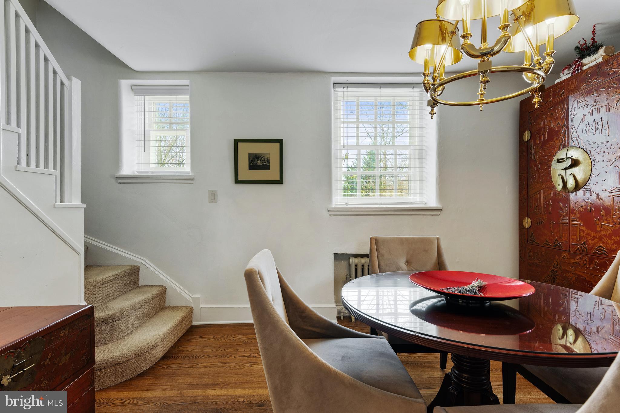 8201 Fenton Road Glenside, PA 19038 - Photo 60 of 86 a view of a dining room with furniture and wooden floor