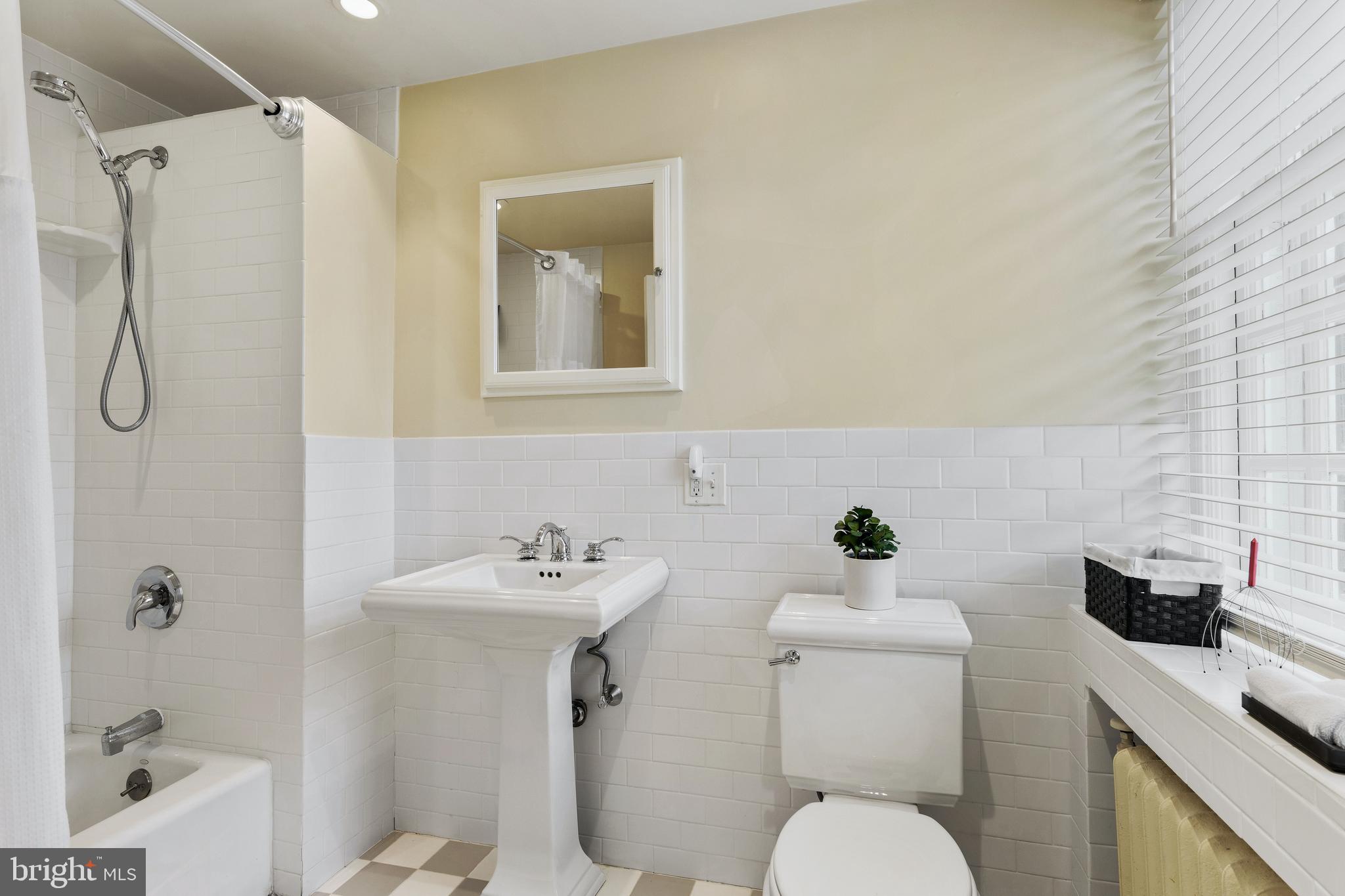 8201 Fenton Road Glenside, PA 19038 - Photo 75 of 86 a bathroom with a sink toilet and shower