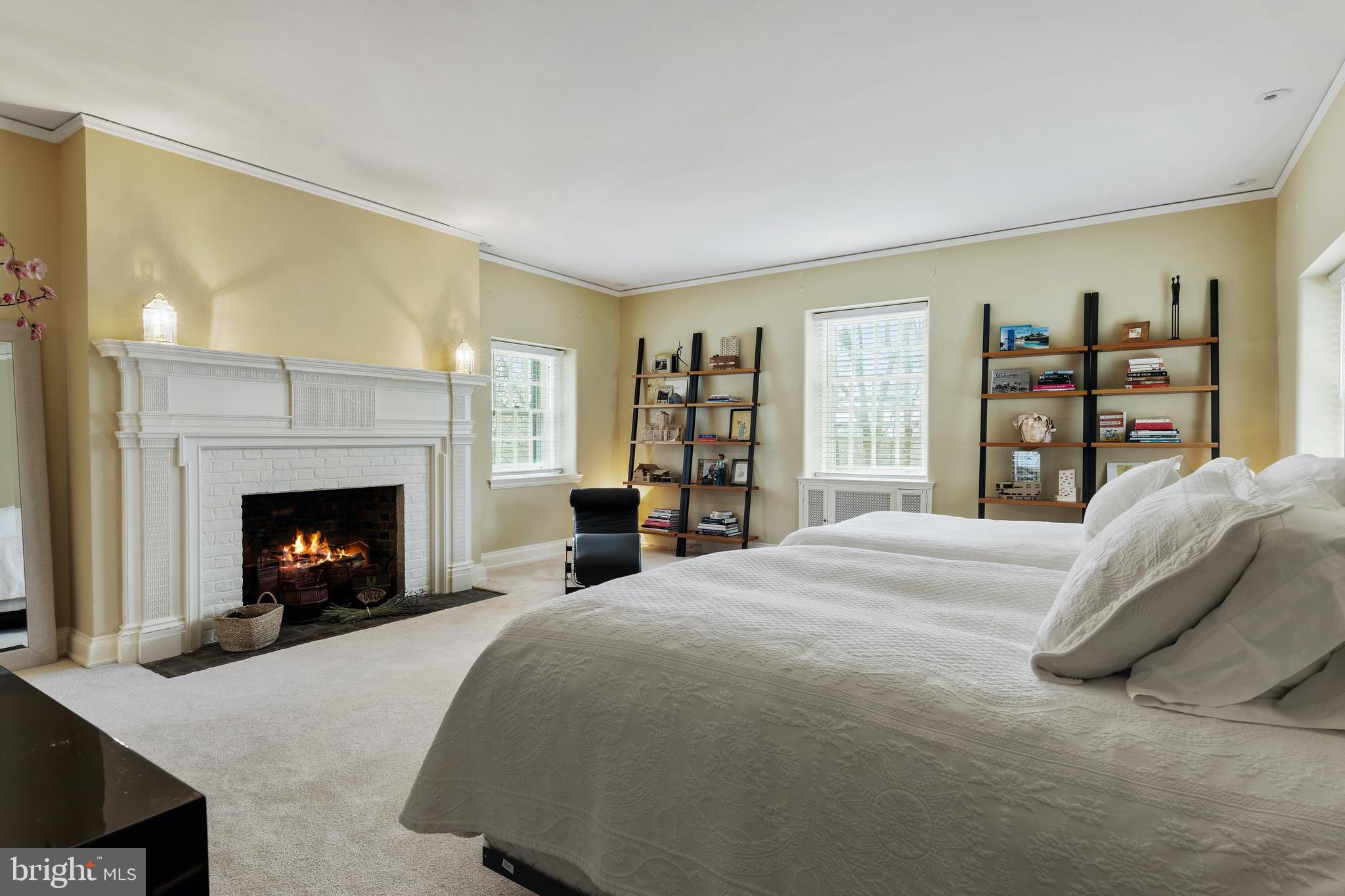 8201 Fenton Road Glenside, PA 19038 - Photo 76 of 86 a bed room with a bed and a fireplace