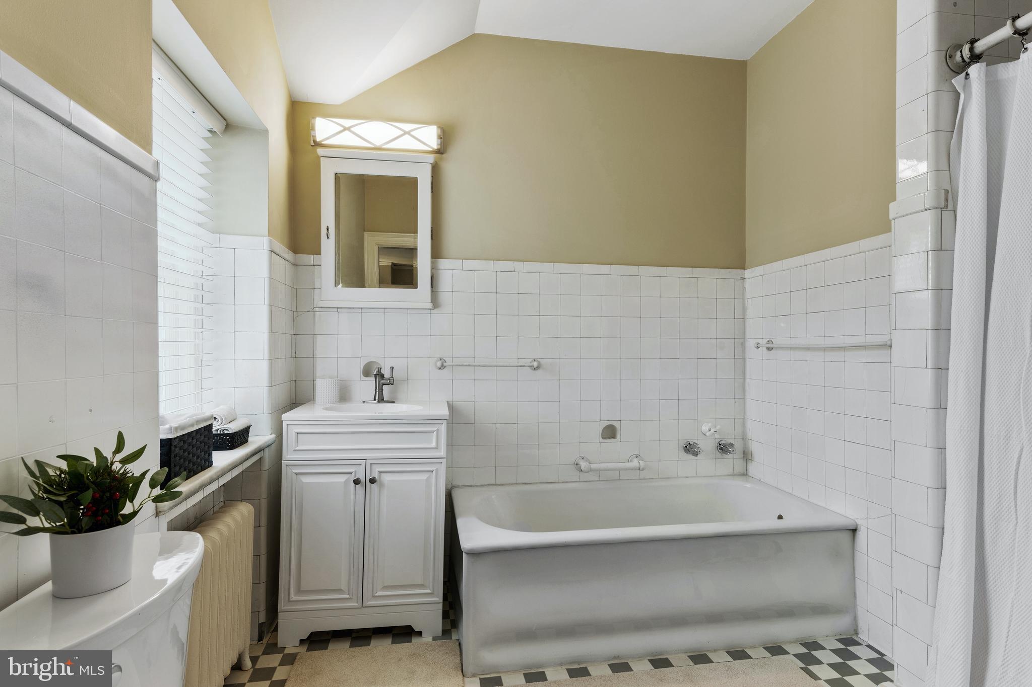 8201 Fenton Road Glenside, PA 19038 - Photo 78 of 86 a bathroom with a sink a toilet and shower