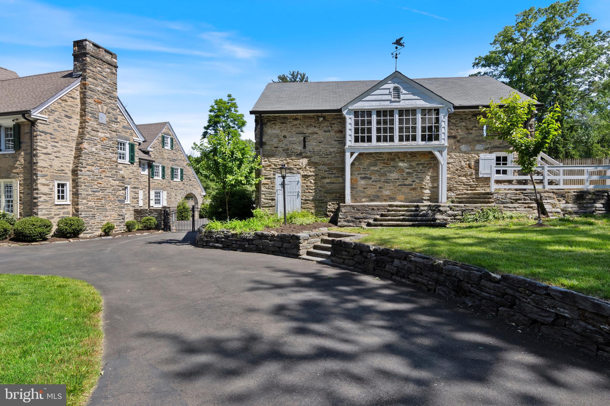 8201 Fenton Road Glenside, PA 19038 - Photo 8 of 86 a front view of a house with a yard