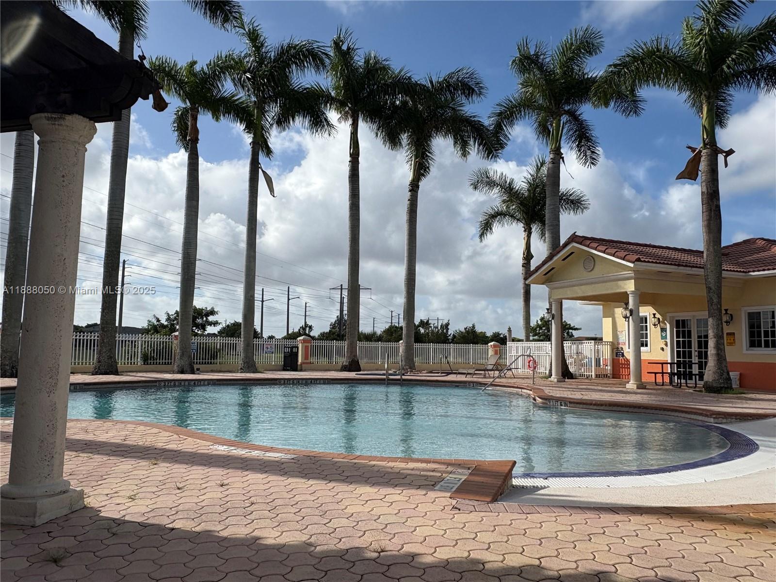 18038 Northwest 74th Court Hialeah, FL 33015 - Photo 36 of 39 a view of outdoor space with swimming pool
