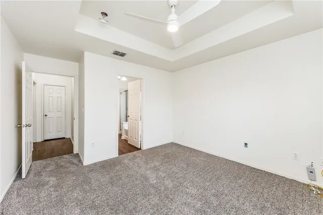 a bathroom with a tub and shower