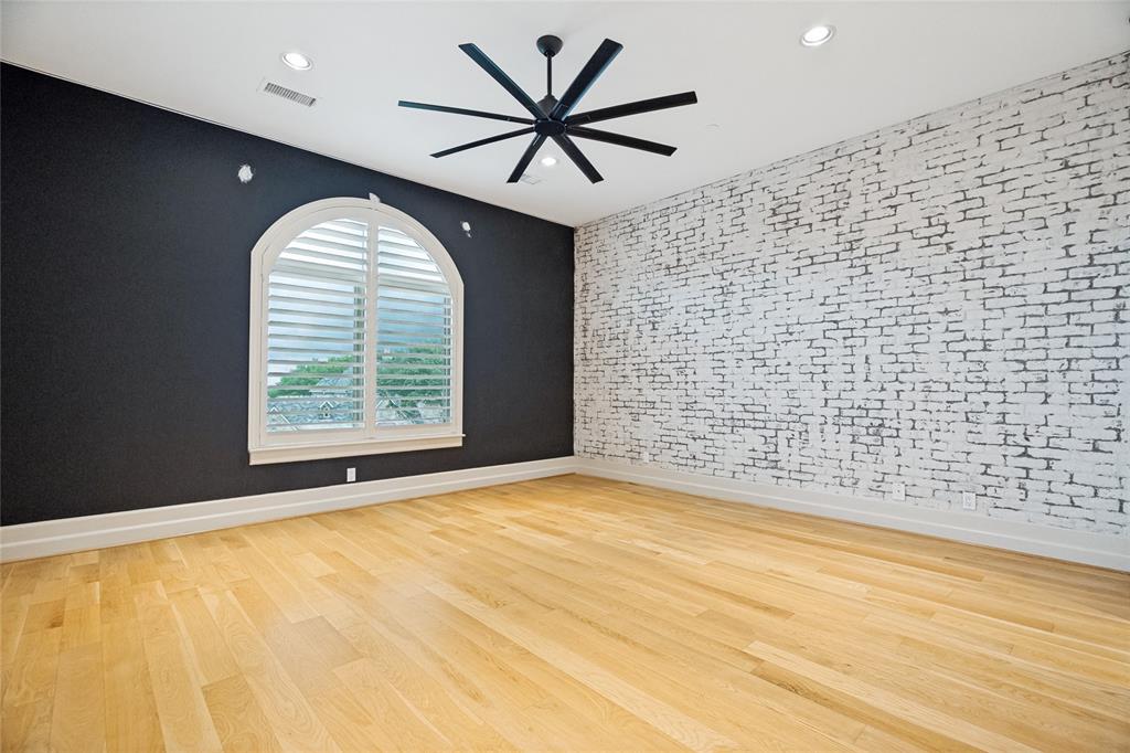 6432 Sudbury Road Plano, TX 75024 - Photo 26 of 38 a view of an empty room with a window and a chandelier