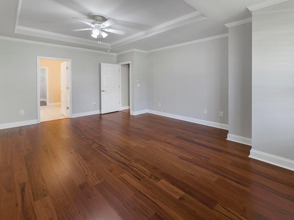 820 Freedom Lane Roswell, GA 30075 - Photo 19 of 30 wooden floor in an empty room with a window