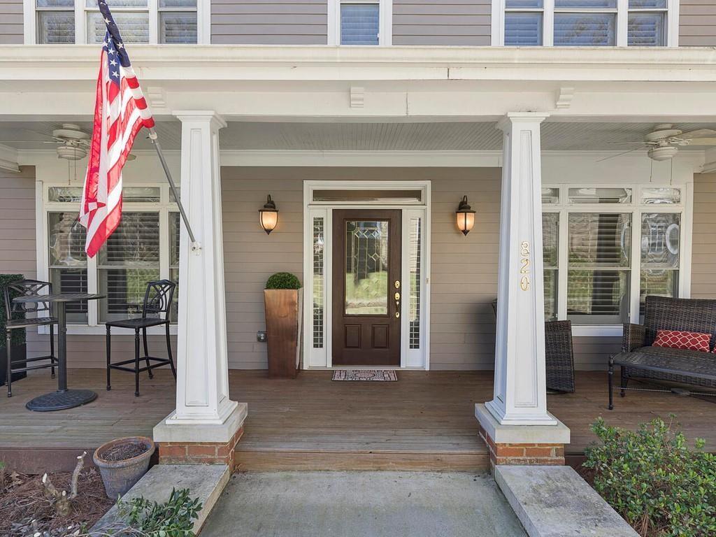 820 Freedom Lane Roswell, GA 30075 - Photo 2 of 30 a front view of a house with a porch
