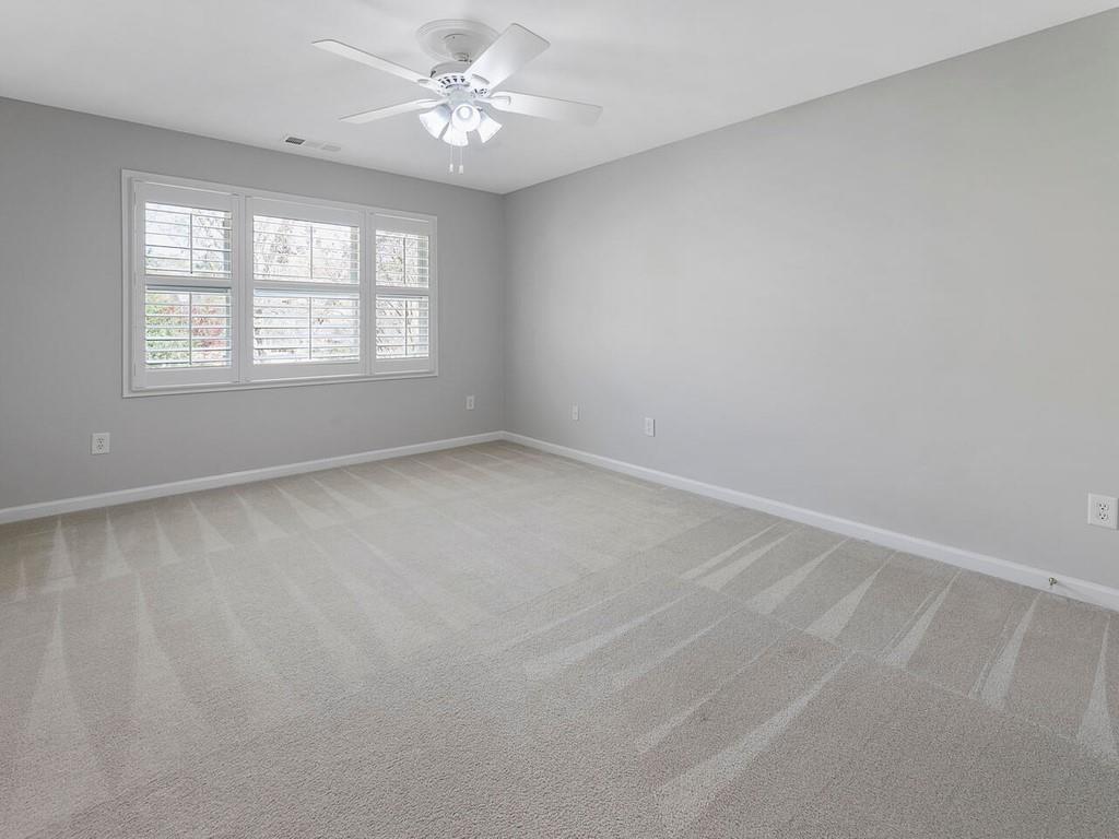 820 Freedom Lane Roswell, GA 30075 - Photo 28 of 30 an empty room with a window