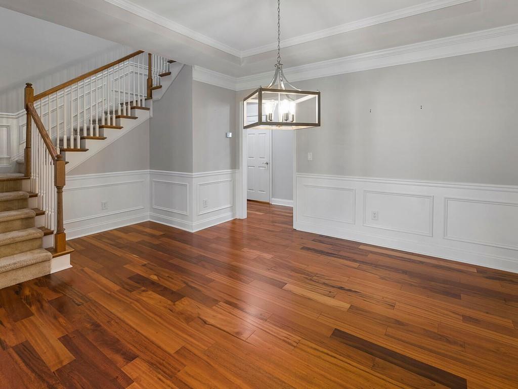820 Freedom Lane Roswell, GA 30075 - Photo 10 of 30 a view of empty room with wooden floor and fan