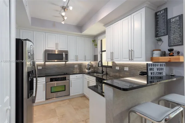 $5,685 | 1650 Galiano Street, Unit TH14, Coral Gables, FL 33134