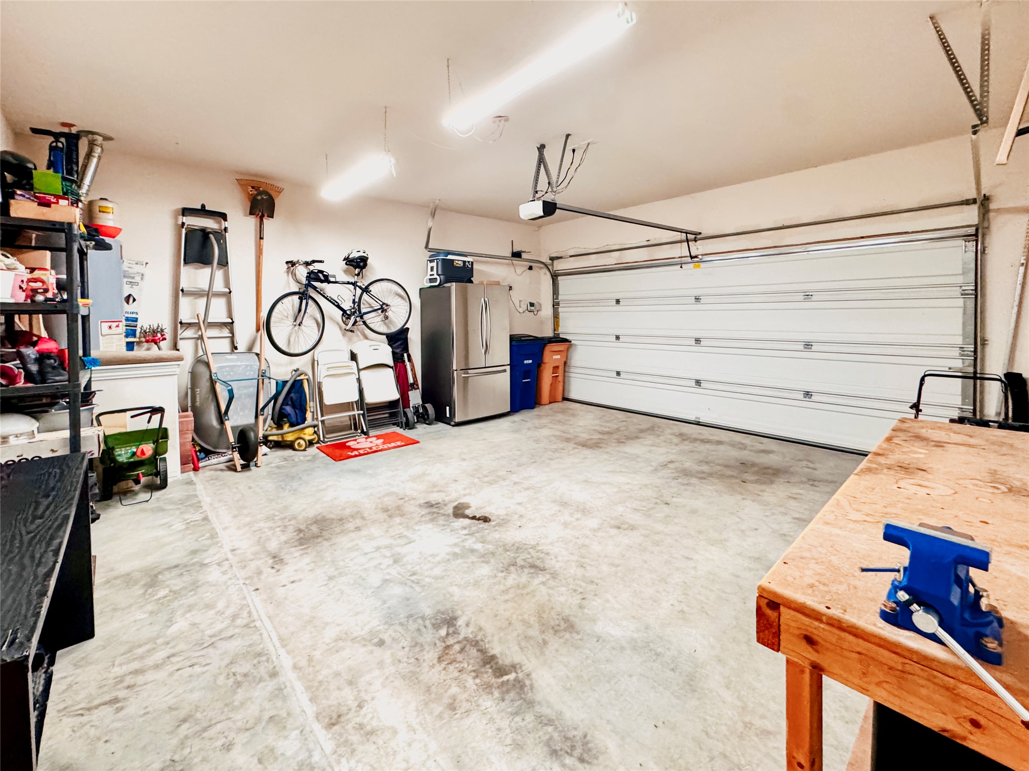 6905 Vail Ridge Street Austin, TX 78744 - Photo 26 of 39 Concrete flooring throughout the garage space