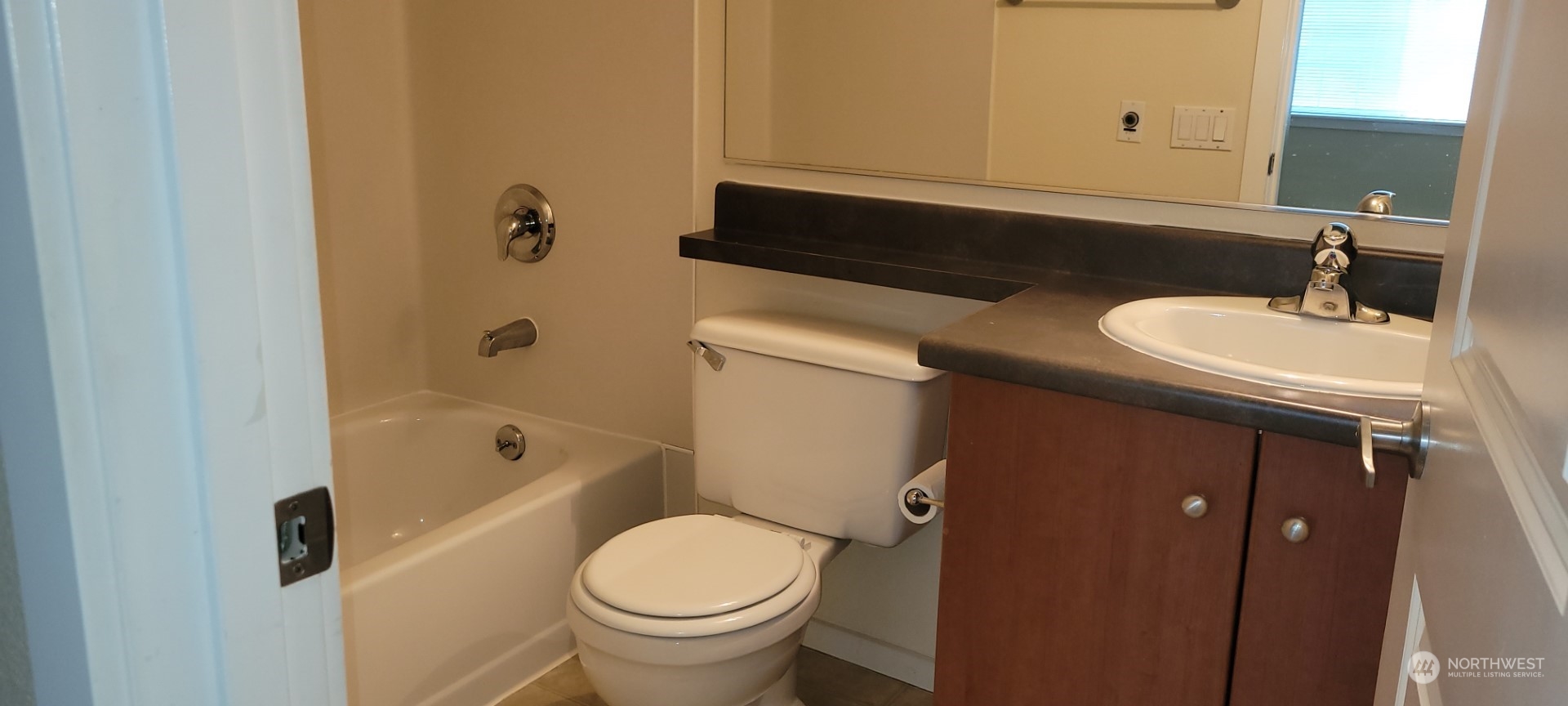 12404 East Gibson Road, Unit D201 Everett, WA 98204 - Photo 11 of 22 a bathroom with a sink and a mirror