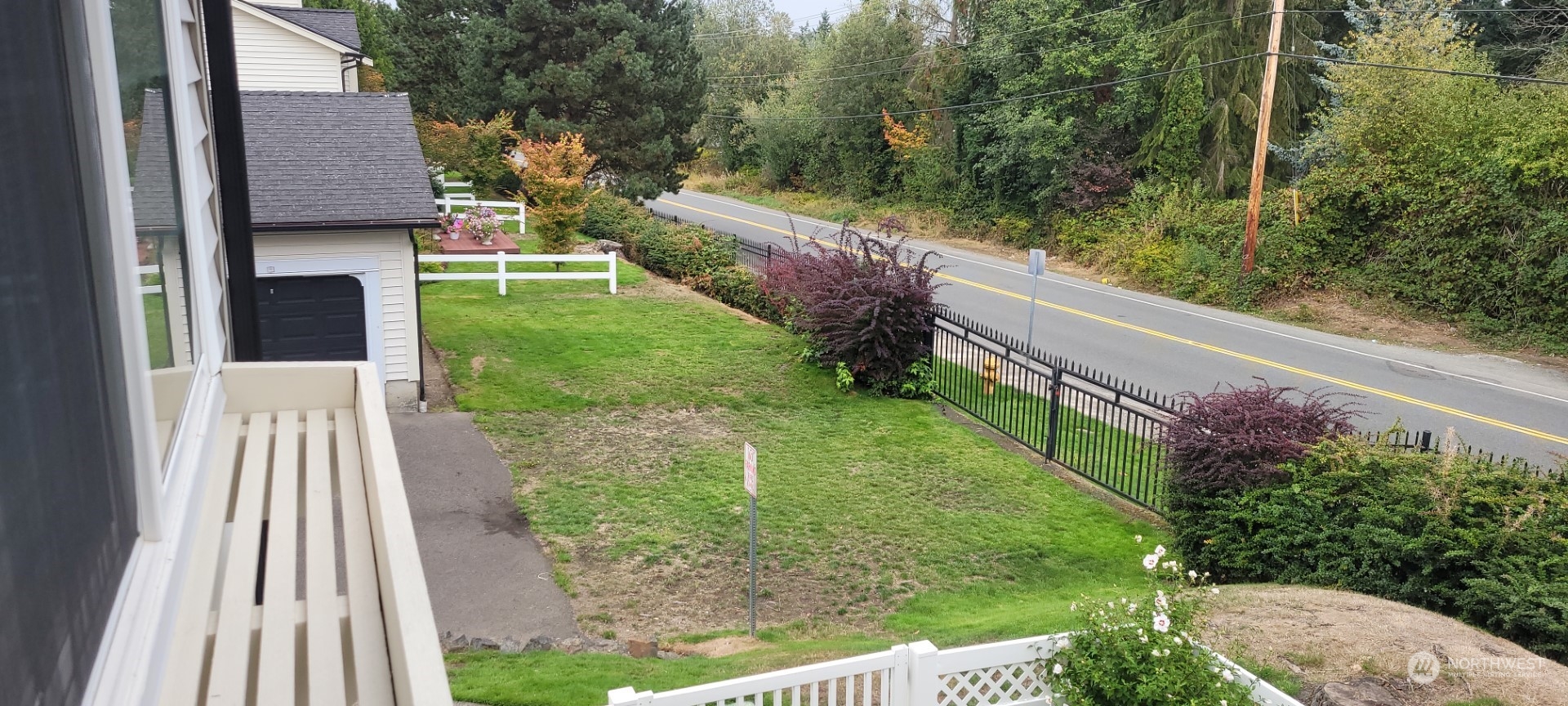 12404 East Gibson Road, Unit D201 Everett, WA 98204 - Photo 16 of 22 a view of a yard with potted plants