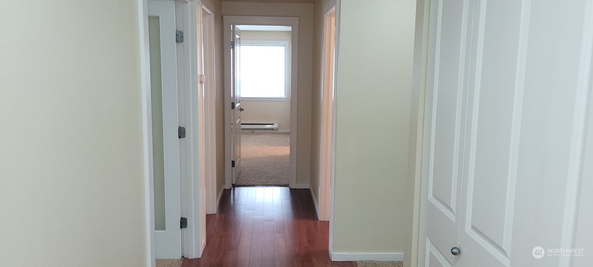 12404 East Gibson Road, Unit D201 Everett, WA 98204 - Photo 4 of 22 a view of a bathroom with wooden floor