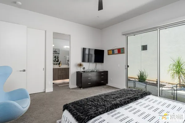 a bedroom with furniture and a couch