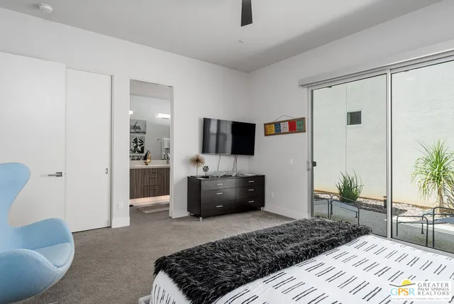 a bedroom with furniture and a couch