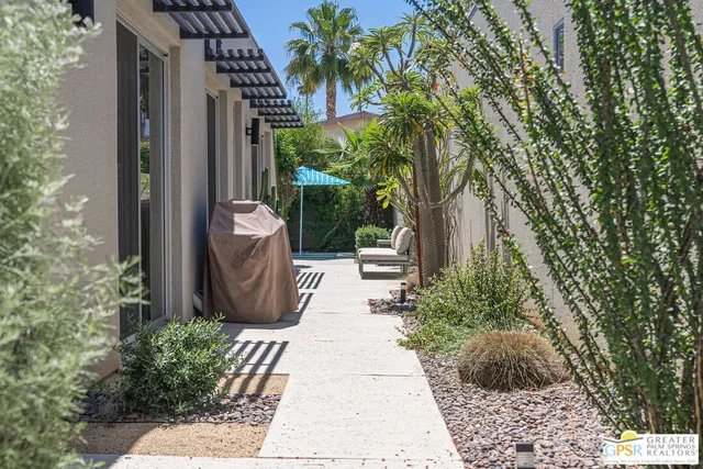 a house view with a garden space