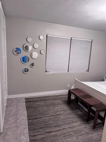 a room with furniture and a wooden floor