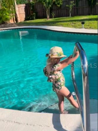 6304 Beechwood Avenue Sarasota, FL 34231 - Photo 26 of 41 a view of a golf ground with huge green field and large trees