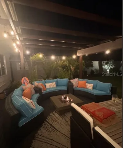 a media room with lots of chairs and a projector screen