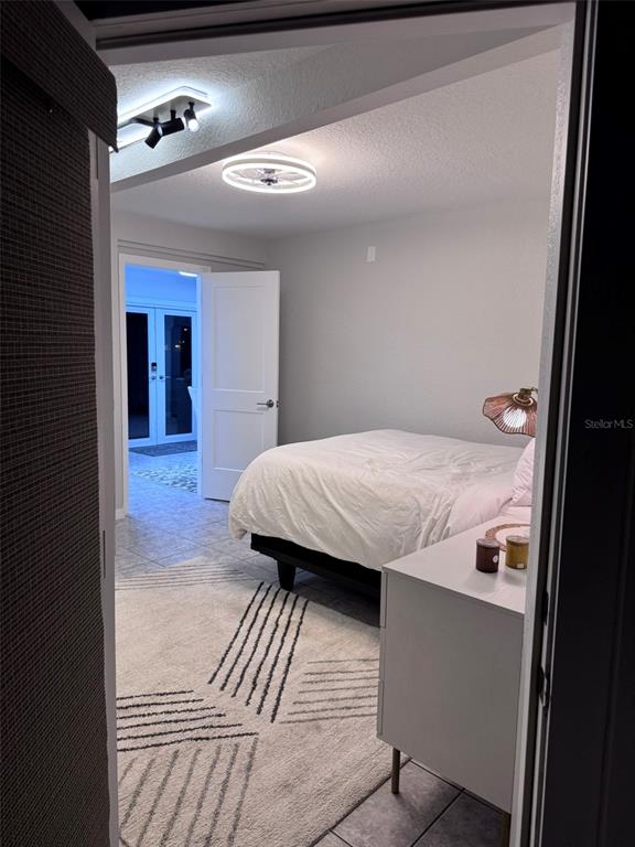 6304 Beechwood Avenue Sarasota, FL 34231 - Photo 8 of 41 a en suite bathroom with a granite countertop sink and a mirror