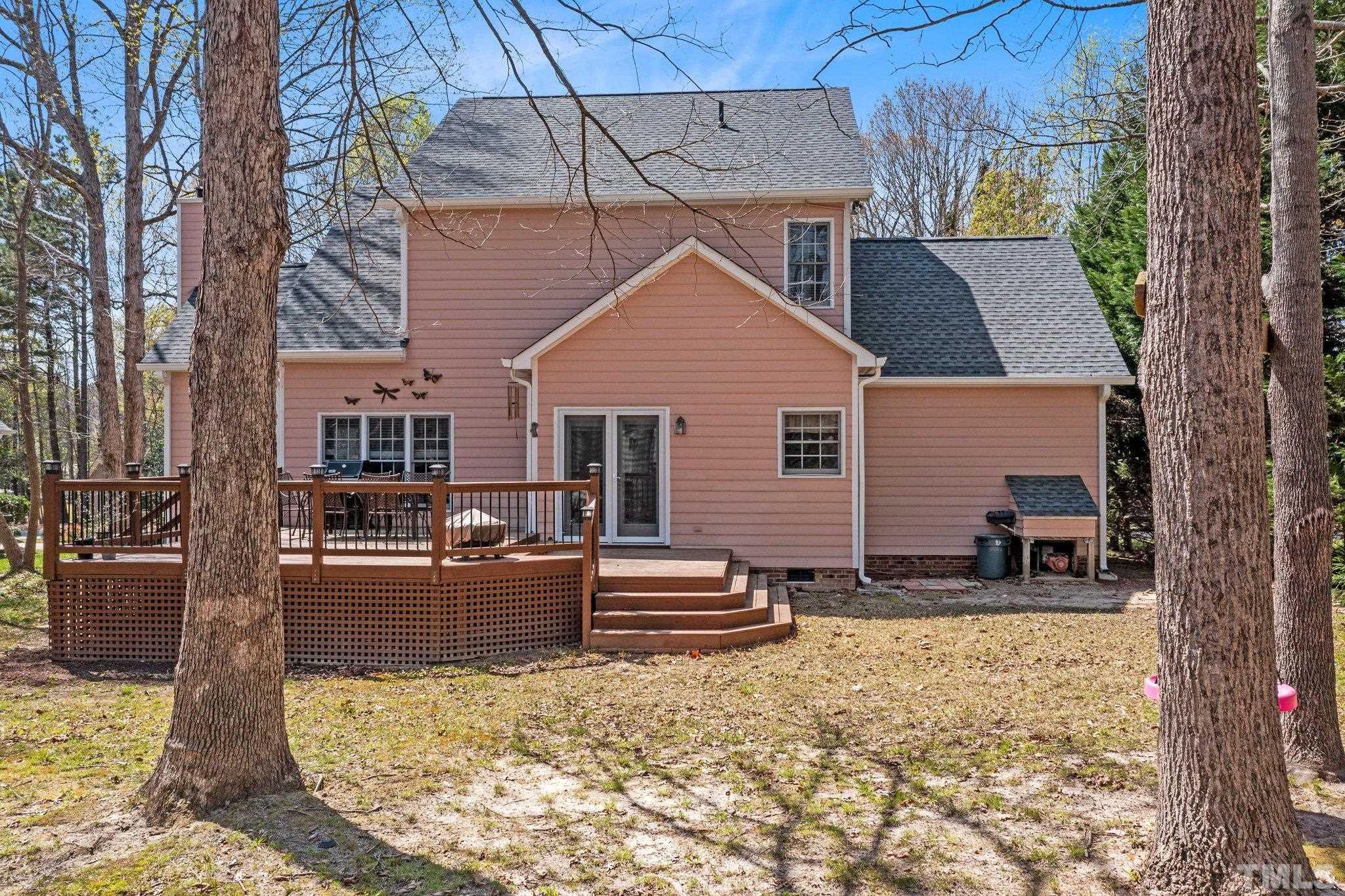 3408 Ribcowski Court Raleigh, NC 27616 - Photo 33 of 48 a front view of a house with a tree