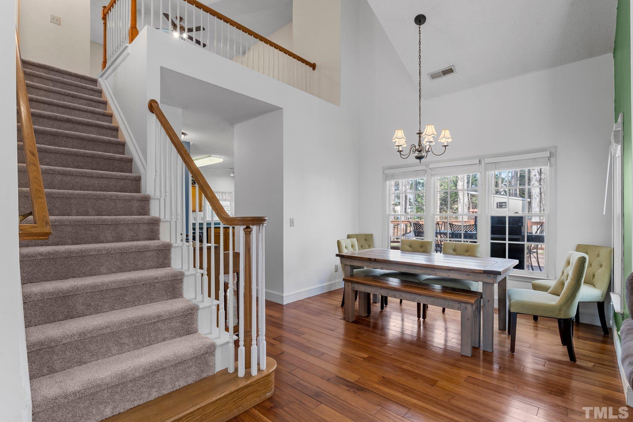 3408 Ribcowski Court Raleigh, NC 27616 - Photo 6 of 48 a view of a dining room with furniture window and wooden floor