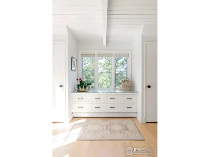 a room with furniture and window