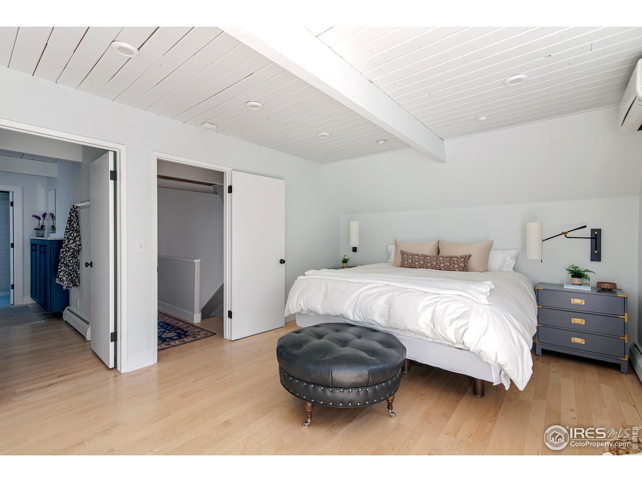 65 Bristlecone Way Boulder, CO 80304 - Photo 20 of 49 a bedroom with a bed and a view of bathroom